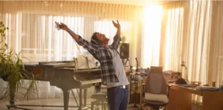 Habits That Boost Happiness: What Science Says About Feeling Better A happy man dancing in living room