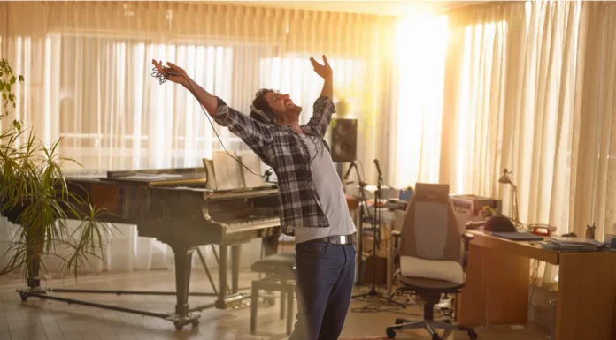 Habits That Boost Happiness: What Science Says About Feeling Better A happy man dancing in living room