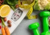 How to Boost Your Metabolism Naturally After 30 weight scale, with tape measure and dumbells