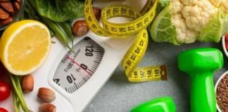 How to Boost Your Metabolism Naturally After 30 weight scale, with tape measure and dumbells