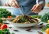 The Truth About Eating Insects and Their Surprising Health Benefits A plate of edible insects arranged with fresh vegetables on a kitchen counter, with a hand holding chopsticks reaching to pick up an insect.